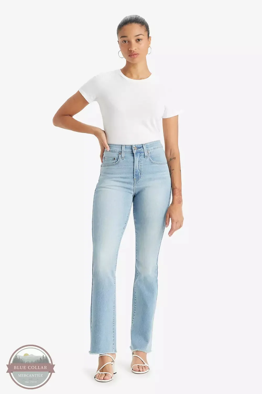 725 High Rise Bootcut Jeans in Just Landed Light Wash by Levi's 18759-0154