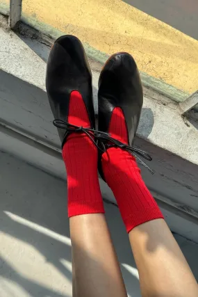 Her Socks in Flame